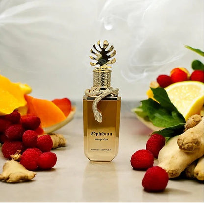 Ophidian Mango Bliss by Paris Corner surrounded by fresh mango, berries, ginger, and citrus, showcasing its fruity fragrance profile.