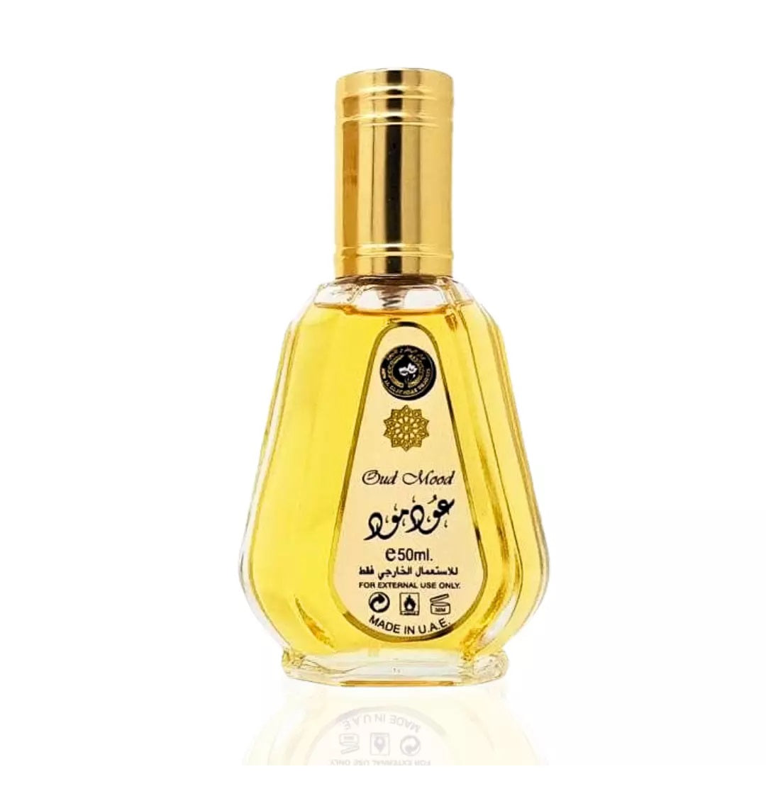 Oud Mood by Ard Al Zaafran - 50ml Eau de Parfum bottle with a luxurious golden cap and elegant design.