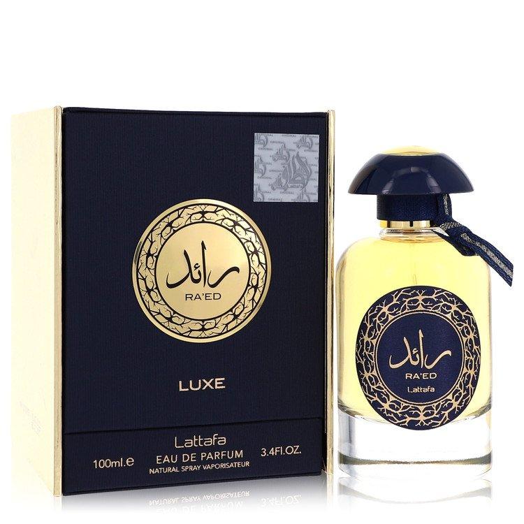 Ra'ed Luxe Gold by Lattafa, showcasing the luxurious 100ML gold and navy blue perfume bottle alongside its elegant packaging box, perfect for men and women.