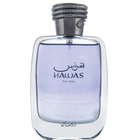 Rasasi Hawas for Men 100ML Eau De Parfum, featuring a sophisticated clear bottle with a silver python-wrapped cap.