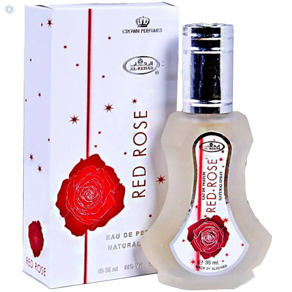 Red Rose Eau De Parfum 35ml by Al-Rehab, featuring a frosted bottle with a silver cap and elegant packaging adorned with vibrant red rose graphics, embodying its floral and woody fragrance.