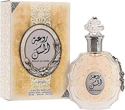 Rouat Al Musk Eau de Parfum by Lattafa, featuring an ornate transparent bottle with intricate detailing and luxurious golden packaging, 100ML fragrance.