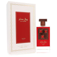Royal Sapphire Eau de Parfum by Lattafa Pride, featuring an elegant red and bronze perfume bottle alongside a white and gold-trimmed packaging box, 100ML unisex fragrance.