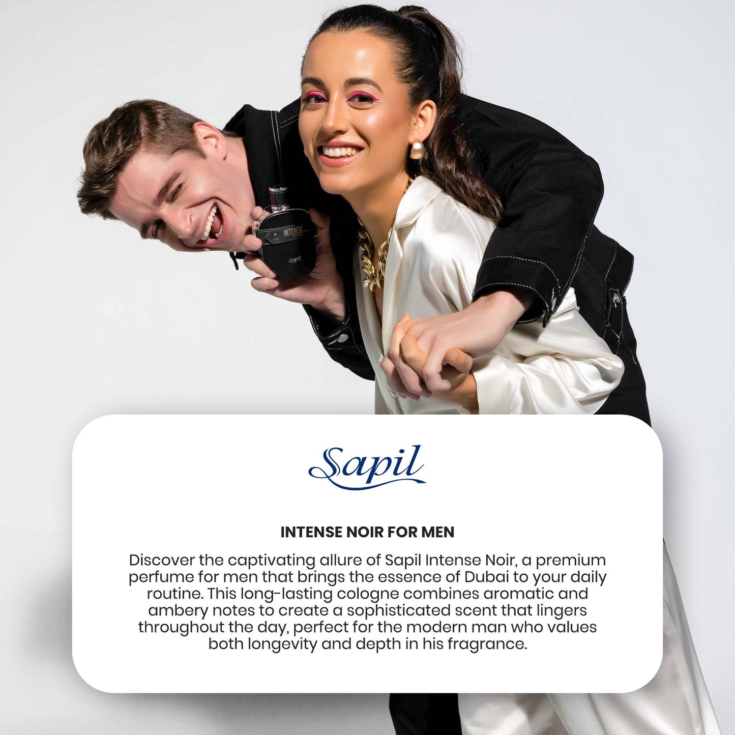Man and woman posing with Sapil Intense Noir for Men perfume bottle in lifestyle photo