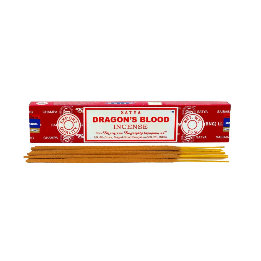 Satya Dragon's Blood Incense 15g pack with neatly arranged incense sticks, featuring bold red packaging and a mystical fragrance for purification and positive energy.