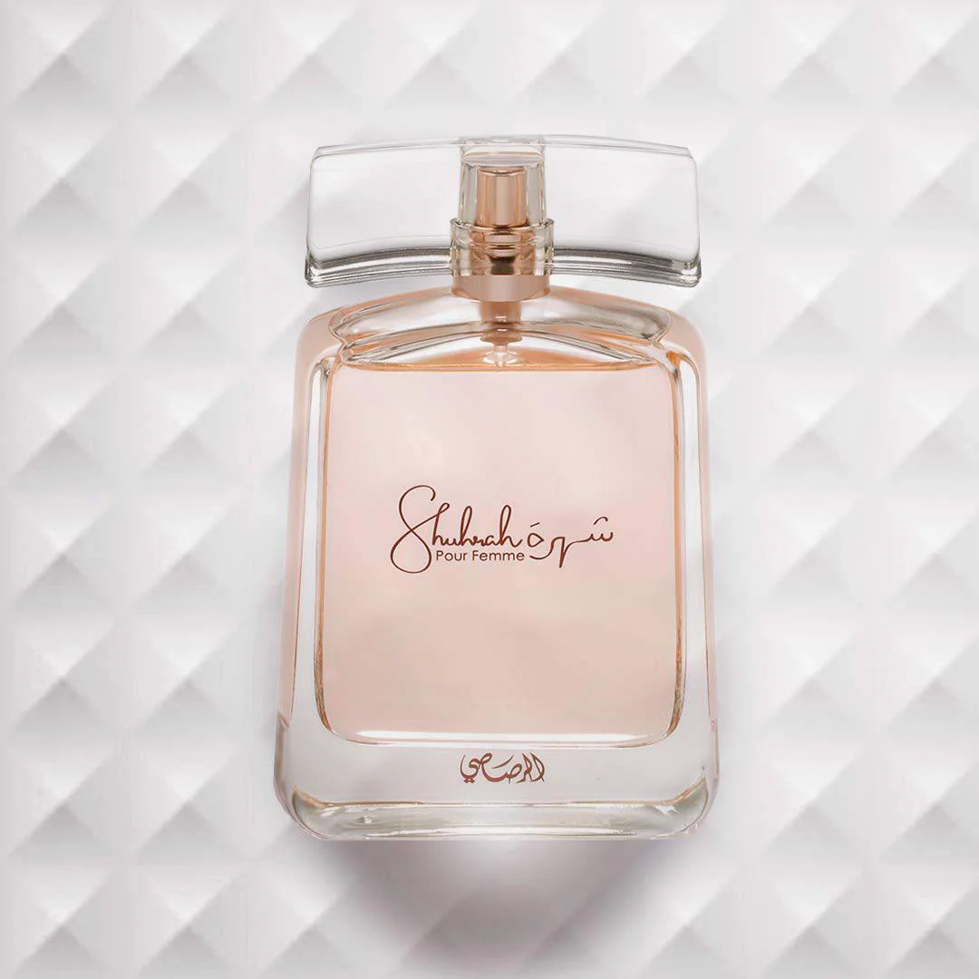 Rasasi Shuhrah Pour Femme perfume bottle with cap removed, showcasing its refined design.