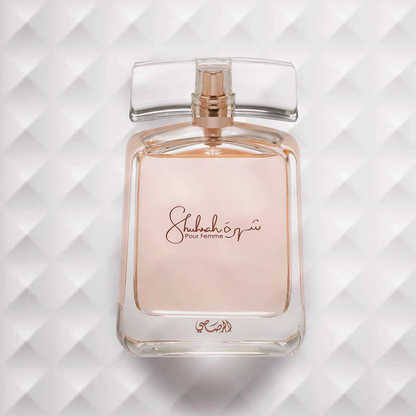 Rasasi Shuhrah Pour Femme perfume bottle with cap removed, showcasing its refined design.