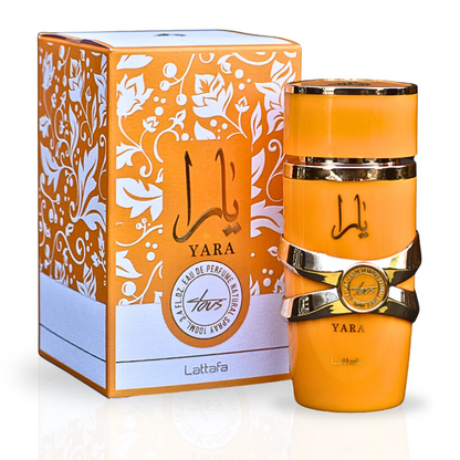 Yara Tous by Lattafa Eau de Parfum, 100ML bottle in a vibrant orange design with a matching decorative box, showcasing its luxurious presentation.