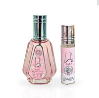 Yara EDP Spray 50ML and Yara Roll-On CPO 10ML by Ard Al Zaafaran, displayed against a soft pink floral background.